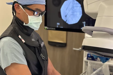 Physiatrist Dr. Allen Chen, pictured here preparing for a procedure