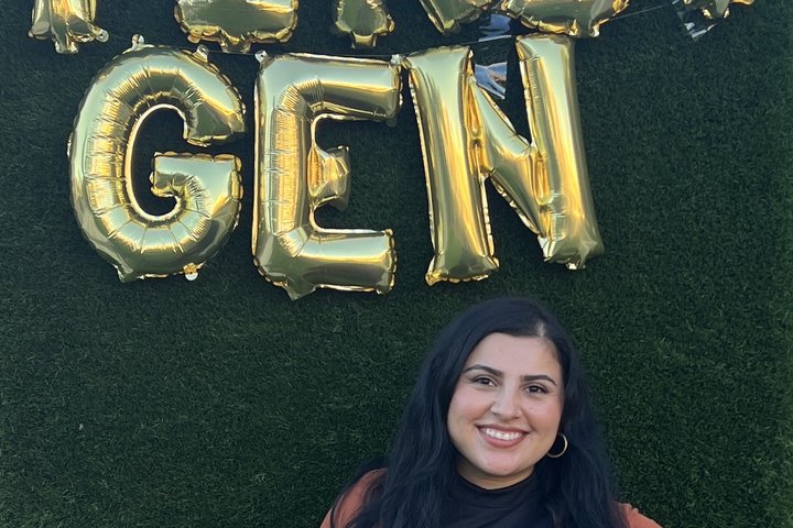 Liliana Perez, posing at a first-gen student event, shares why she's becoming a doctor
