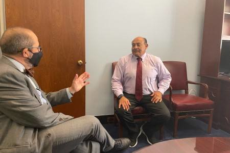 Dr. Joaquin Madrenas visits with Rep. Lou Correa