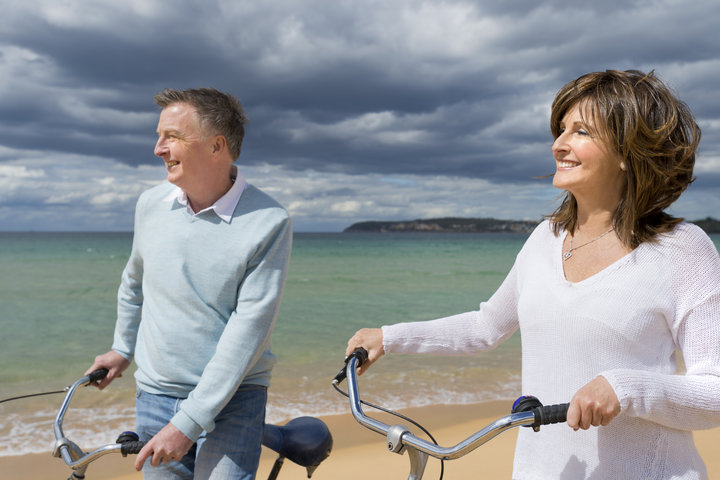 How To Prevent Dementia Senior Couple on Beach with Bicycles