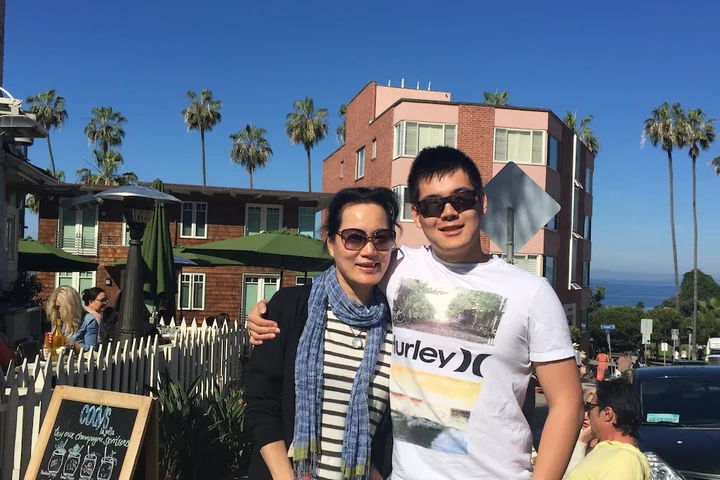 DGSOM alumni Louie Wang and his mother