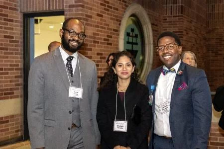 Daniel Okobi, left, Elizabeth Heredia and Dr. Lawrence Benjamin
