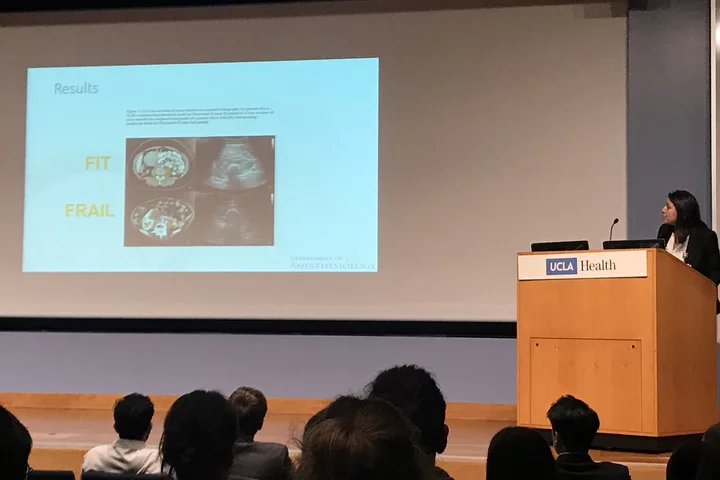 UCLA's Dr. Cecilia Canales, pictured speaking about her frailty research at an anesthesiology conference, shares her expertise about anesthesia side effects.