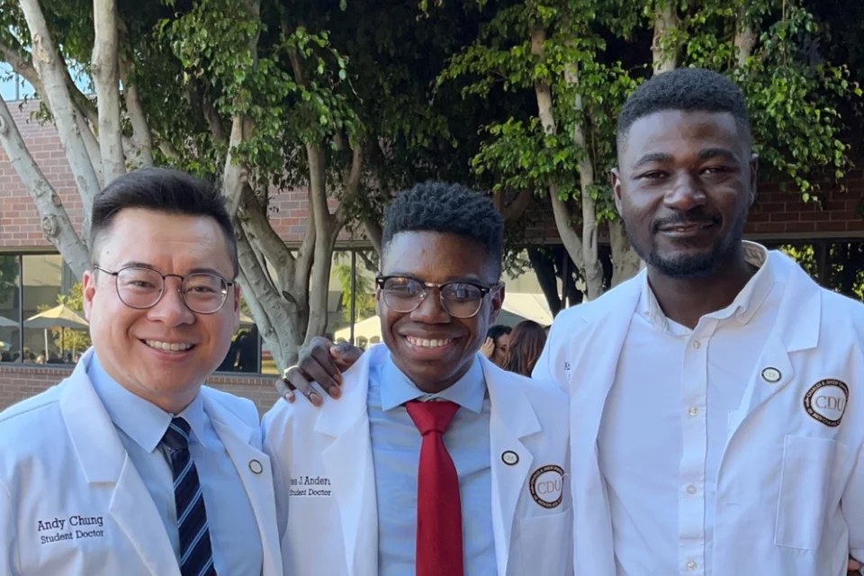 Medical students smiling for a photograph
