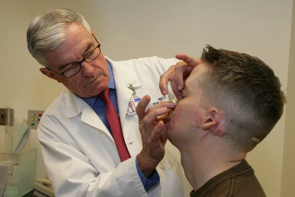 A physician treats a patient