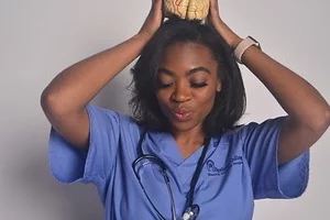 Medical student Shami-Iyabo Mitchell, pictured here for a medical photo op, shares her story of becoming a doctor.