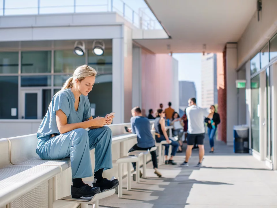 UCLA Med Student on Phone in Courtyard