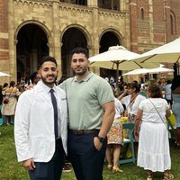 Becoming a Doctor: Gustavo Castellanos and his brother at the White Coat Ceremony