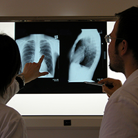 Medical Licensure for Residency Two Doctors Reviewing a Chest X Ray