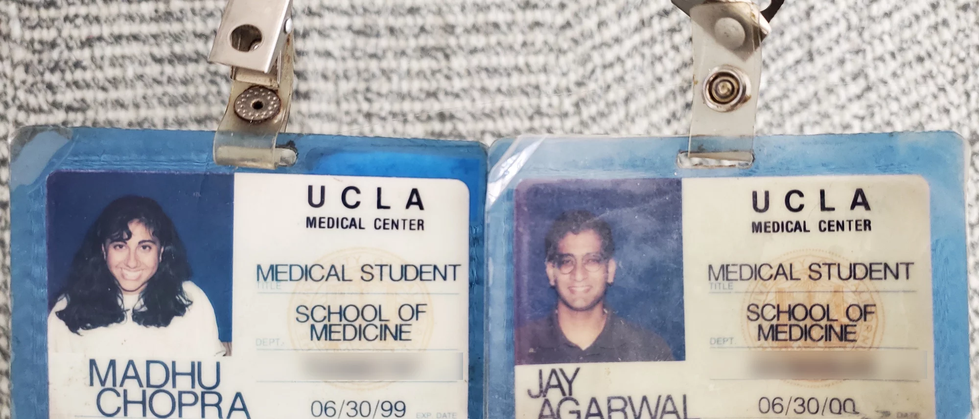Medical school identification badges for two alumni from 1998
