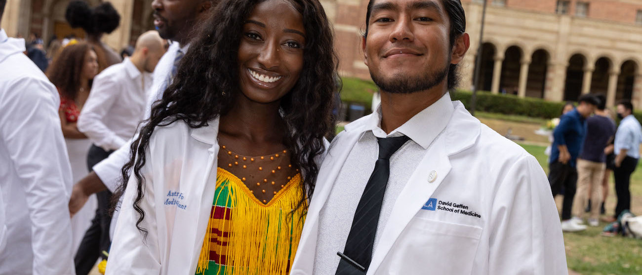 Becoming a doctor story: Faustino Gonzalez Barrales and a friend during their White Coat Ceremony