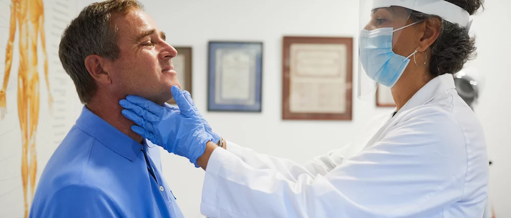 UCLA Health Endocrinologist Performs Thyroid Disorder Physical Examination