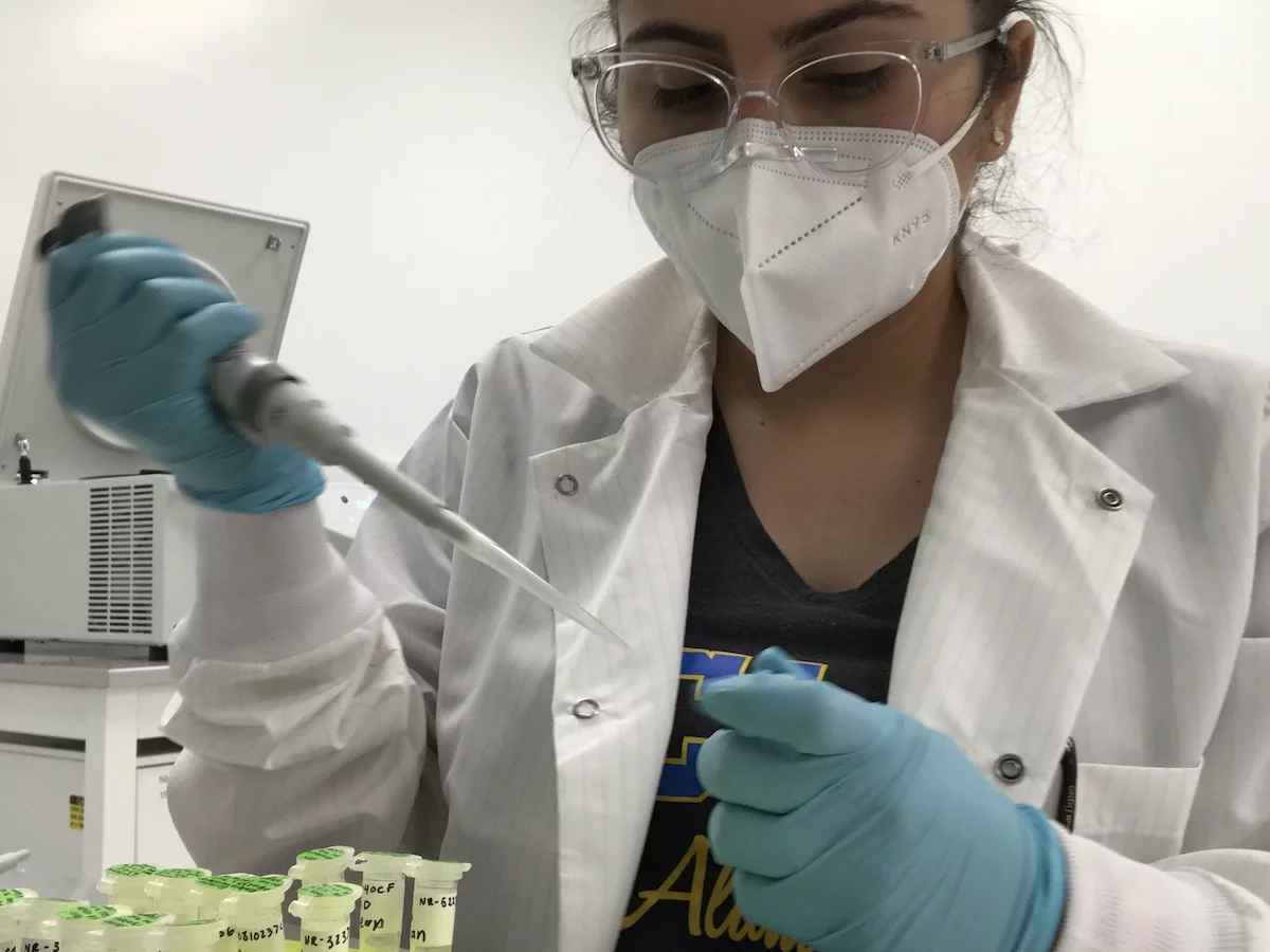 Liliana Perez, pictured completing COVID-19 sequencing, shares why she's becoming a doctor