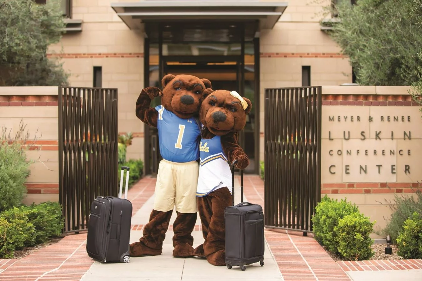Joe and Josie Bruin posed in front of the Luskin Conference Center