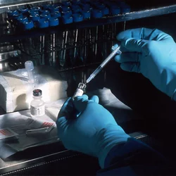 A lab technician working on a blood test