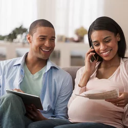 Pregnant couple smiling