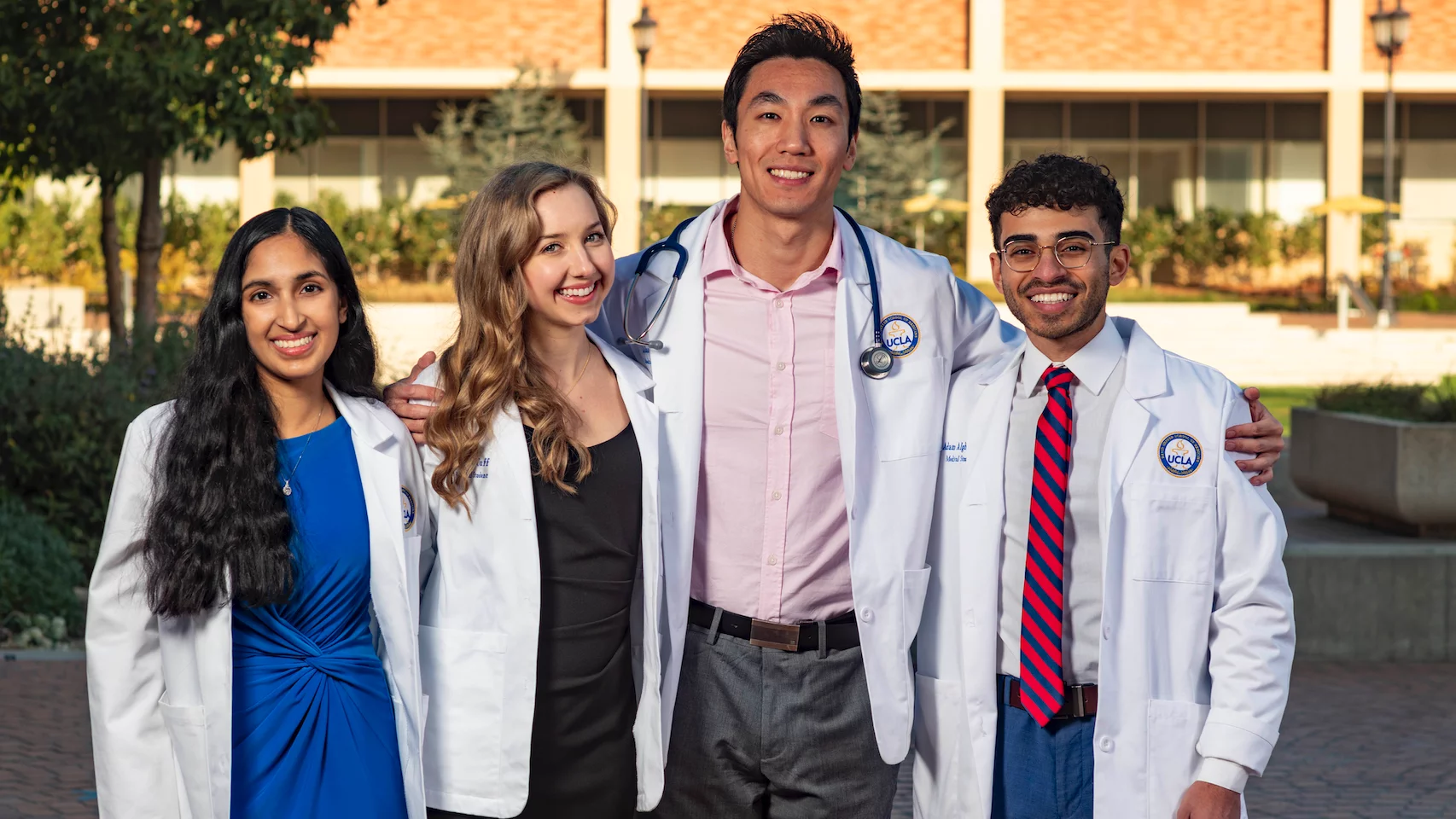 DGSOM Admissions A group of medical school student embracing at the White Coat Ceremony 2022