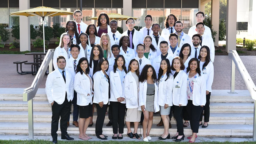 Group of pre-med students in white coats