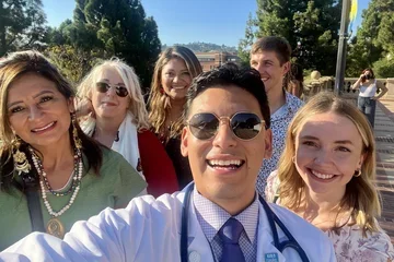DGSOM medical student Jose Segura-Bermudez posing with friends and family