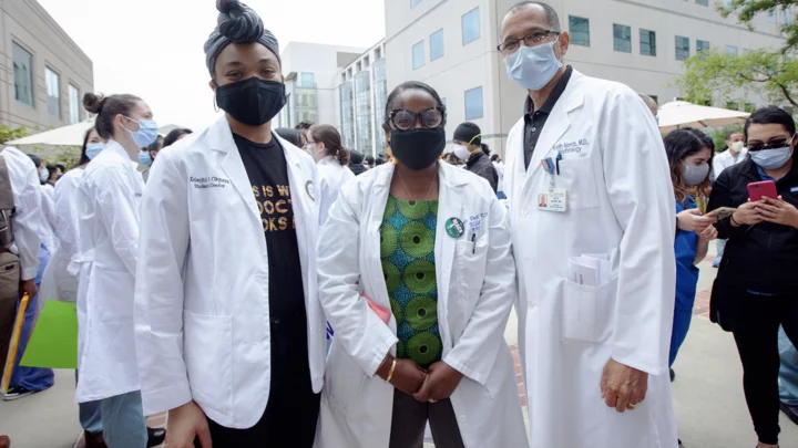 Medical school students and leaders at an anti-racism event