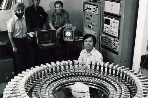 A group of people working at the medical school nuclear medicine lab