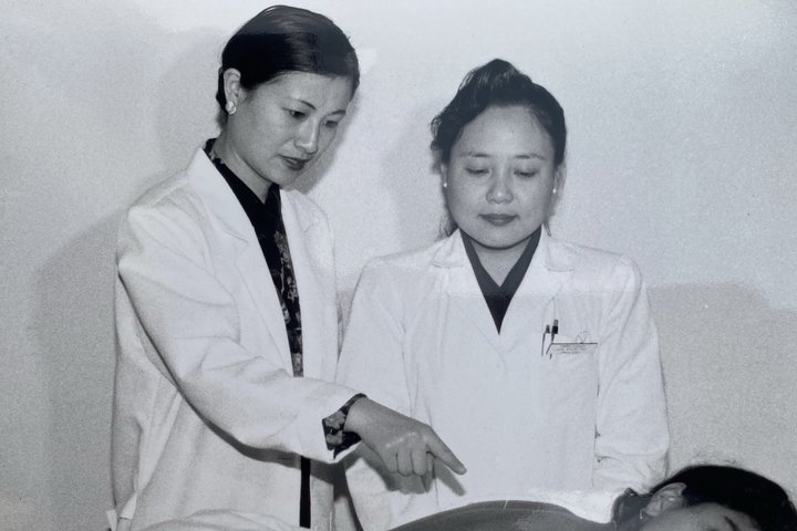 Medical student Chelsea discusses how her mother, pictured here performing acupuncture, played a primary role in Chelsea’s story of becoming a doctor 
